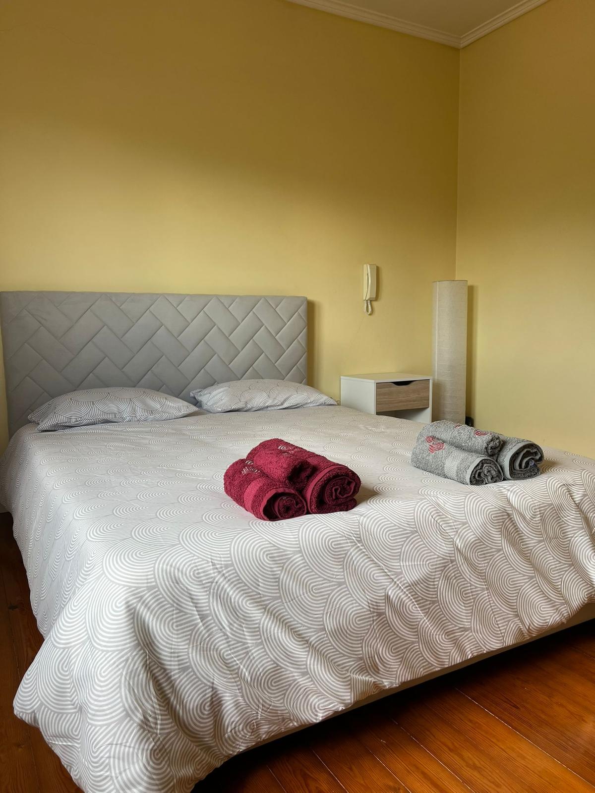Yellow bedroom · bed view